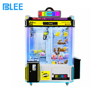 Machine à griffes d'arcade 4 joueurs, à monnayeur, avec distributeur de prix multi-emplacements, joystick, lumières LED et roues