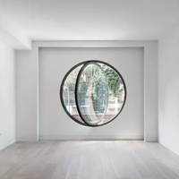 Ventana Circular de Aluminio con Perfil Curvo Liso y Vidrio Transparente con Malla de Acero Inoxidable para Uso Exterior Contemporáneo