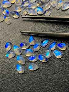 มูนสโตนสีขาวรุ้งทรงลูกแพร์แบบคาโบชอง  พร้อมแสงสีฟ้า  ขนาด 6x4 มม. ถึง 8x10 มม. สำหรับทำเครื่องประดับ - Product Image 2