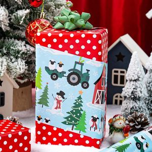 Rollo de Papel de Regalo Navideño Reversible Azul con Diseño de Ovejas, Muñecos de Nieve y Árboles de Navidad Rojos con Copos de Nieve, Tema de Granja - Product Image 3