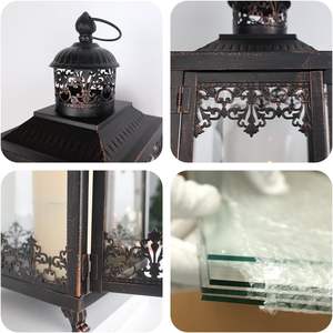 Lanterne en métal au design élégant pour une présentation décorative en intérieur, offrant une lueur douce, idéale pour mettre en valeur les arrangements de la maison - Product Image 2