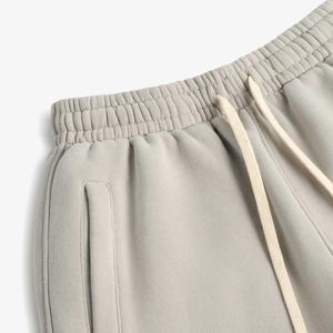 กางเกงวอร์มทรงขาบานแบบวินเทจ ย้อมสีแบบแอซิดวอช รุ่นปี 2026 สำหรับผู้ชาย มีซิปด้านข้าง แต่งขอบดิบ ลายทาง กางเกงวอร์มทรงขาบานสำหรับผู้ชาย - Product Image 3