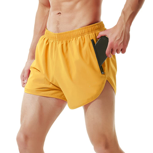 Shorts de course pour homme, couleur unie, séchage rapide, taille mi-haute avec poches zippées, style sportif, tissu tricoté 100% polyester - Product Image 1