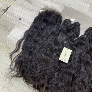 Extensiones de cabello humano vietnamita de onda profunda al por mayor, negro natural, ondulado natural, doble trama, cosidas a máquina, directamente de fábrica. - Product Image 3