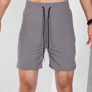 Pantalones cortos de gimnasio tejidos de algodón 100% diseñados por el fabricante Pantalones cortos deportivos de secado rápido para hombres Logotipo personalizado Impreso Patrón sólido Decoración - Product Image 4