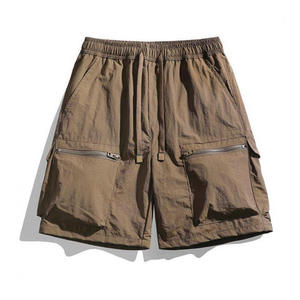 Shorts d'été pour hommes en coton tissé, taille mi-haute, respirants, couleur unie, coupe courte, multi-poches, séchage rapide, décontractés, sportifs, avec cordon de serrage - Product Image 1