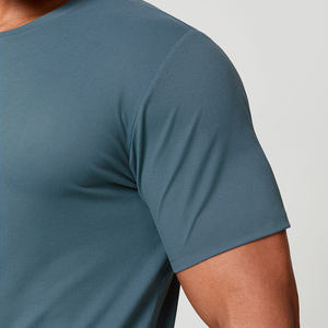 T-shirt de sport en polyester bleu sarcelle pour homme - T-shirt d'entraînement athlétique à séchage rapide - Vêtements d'équipe personnalisés directement de l'usine de Sialkot - Product Image 4