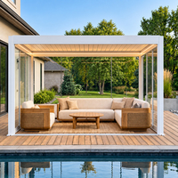 Pergola bioclimatique moderne en aluminium avec portes coulissantes en verre et éclairage LED pour terrasse de piscine ou villa