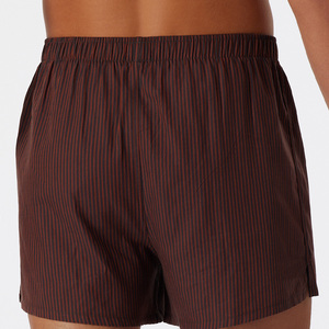 Calzoncillos bóxer sin costuras de cintura media para hombre, de tela de punto transpirable, de secado rápido, con logo digital impreso en la cintura y patrón liso. - Product Image 4