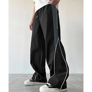 Pantalon de survêtement noir léger à jambe large, taille mi-haute avec cordon de serrage, coupe droite, bandes latérales contrastées, style streetwear décontracté pour homme - Product Image 1
