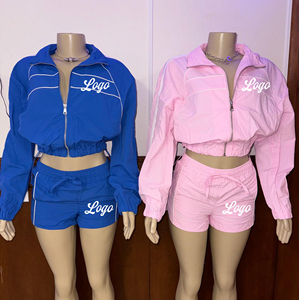 Conjunto Deportivo Cortavientos para Mujer con Logotipo Personalizado, 2 Piezas, Chaqueta con Cierre y Manga Larga, Pantalones Cortos de Poliéster - Product Image 1