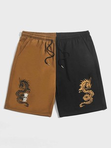 กางเกงขาสั้นซับลิเมชั่นคุณภาพพรีเมียม รับผลิตตามแบบ OEM พร้อมพิมพ์ลายตามสั่ง กางเกงขาสั้นลำลองสำหรับผู้ชายและผู้หญิง - Product Image 2