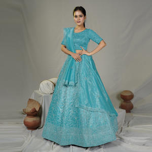 Lehenga Choli traditionnel en tissu sergé orné d'un riche travail de broderie, silhouette évasée, chemisier et dupatta fluide et doux, idéal pour les mariages. - Product Image 1