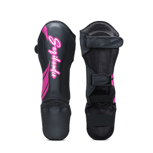 Protège-tibias personnalisés en cuir synthétique imperméable pour Muay Thai MMA avec cadre en acier haute teneur en carbone |   Protection professionnelle pour la boxe - Product Image 1