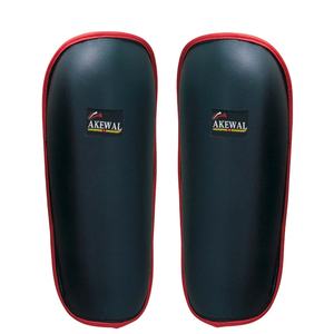 AKEWAL Espinilleras personalizadas de alta calidad hechas de cuero sintético Protector deportivo personalizado Productos de boxeo al por mayor - Product Image 1