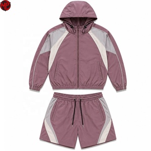 Conjunto deportivo de dos piezas de nailon con bloques de color, ligero, con cremallera, estilo casual, unisex, conjunto de chaqueta de nailon para hombre - Product Image 1