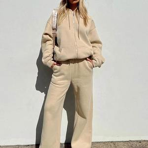 ชุดเซ็ตเสื้อครอปท็อปซิปและกางเกงวอร์มคุณภาพสูงสำหรับผู้หญิง เสื้อผ้าดีไซน์เนอร์สั่งทำพิเศษ ชุดเซ็ตแทรคสูทสองชิ้นพร้อมซิป - Product Image 1