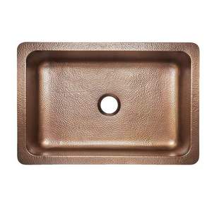 Évier de cuisine en cuivre style ferme avec façade classique et texture martelée pour les aménagements intérieurs rustiques - Product Image 1