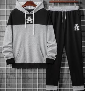 Conjunto de pantalones de chándal y Sudadera con capucha bordados personalizados para hombre para un estilo único - Product Image 1