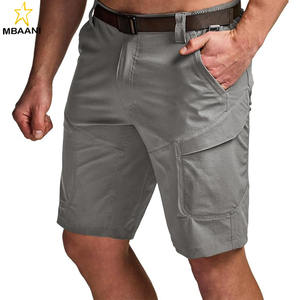 กางเกงขาสั้นคาร์โก้ผู้ชาย แห้งเร็ว ยืดหยุ่นได้ เหมาะสำหรับเดินป่า น้ำหนักเบา กันน้ำ ใช้ได้ทั่วไป ใส่เล่นกอล์ฟ และกิจกรรมกลางแจ้ง มีกระเป๋า - Product Image 1