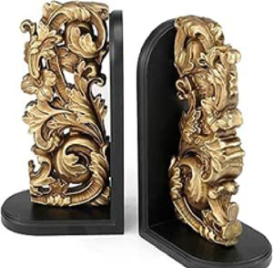 Sujetalibros ornamentados de estilo barroco con decoración dorada y un elegante soporte de metal negro. Disponible a precios de mayorista. - Product Image 1