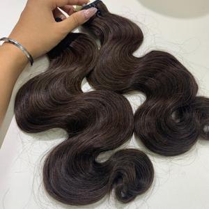 Calidad Raw Vietnamita Cabello Cuerpo Cabello Ondulado Para Mujeres Café Marrón Tendencia Color Extensiones de cabello Venta al por mayor Precio de fábrica - Product Image 1