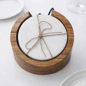 ชุดจานรองแก้วหินอ่อนสีขาวบริสุทธิ์สุดหรู จำนวนสี่ชิ้น รูปทรงกลมขัดเงา ตกแต่งด้วยหินธรรมชาติ - Product Image 3