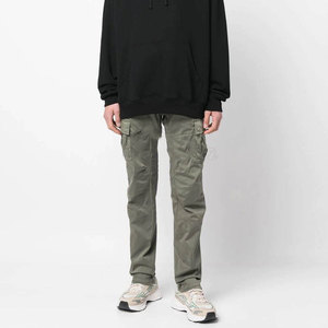 Pantalon cargo vert olive pour homme, plusieurs poches, style workwear en toile, taille mi-haute, fermeture boutonnée, idéal pour le printemps - Product Image 3