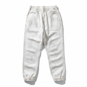 Jogging en toile blanche délavée à l'acide pour hommes. Fabriqués en toile de coton 100% premium, ces pantalons amples et légers offrent une touche unique. - Product Image 1
