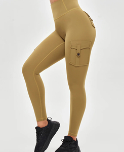 Nouveaux leggings de yoga élégants à taille basse, couleur unie, coupe évasée, sans coutures, avec poches, extensibles dans quatre directions, longueur intégrale, en spandex et polyester - Product Image 1