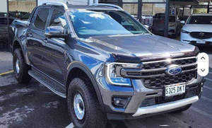 รถกระบะมือสองปี 2022 Ranger Wildtrak 2.0 Bi-Turbo 4x4 เกียร์ออโต้ แบบดับเบิ้ลแค็บ พวงมาลัยซ้าย ภายในสีเข้ม สภาพดี - Product Image 5