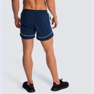 Pantalones cortos de gimnasio con logotipo personalizado para hombre de verano, pantalones cortos de entrenamiento de poliéster sólido con bolsillo para Fitness, deportes, baloncesto, personalizables para - Product Image 6
