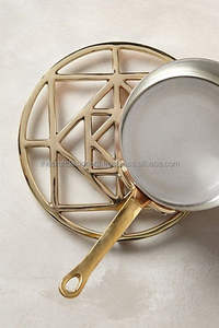 Modern Artistic Metal Sculpted <b>Trivet</b> With Cutout Design Perfect For Stylish Homes And Everyday Cooking Convenience - Product Image 6
