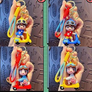 Cute Cartoon Rubber Electric Bike <b>Keychain</b>-Durable & Eco-Friendly for Bags & Keys Bike Lovers - Product Image 3