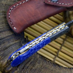 Navaja de bolsillo de acero de Damasco con hoja de punta caída, mango de Micarta, incrustaciones azules y apertura con perilla para el pulgar, para uso en exteriores. - Product Image 5