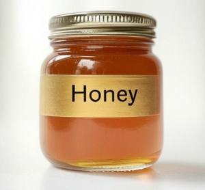 Miel multifloral cruda natural textura gruesa brillo dorado empaquetado limpio para pedidos a granel y uso diario en la cocina del hogar - Product Image 1