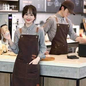 Delantal unisex de cuero con correas de cuero y cierre de botón para uso en restaurantes, bares y por parte del personal de servicio. - Product Image 1