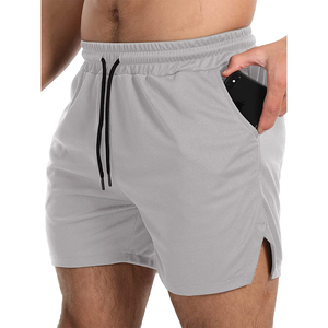 Shorts de sport pour hommes en polyester uni, personnalisables en gros, OEM, haute qualité, avec cordon de serrage à la taille et poches latérales, séchage rapide - Product Image 5