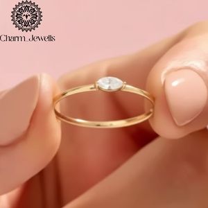 แหวนหมั้นผู้หญิง Charm_Jewells ชุบทอง 18K ประดับเพชรโมอิสซาไนต์ทรงลูกแพร์ ดีไซน์เรียบหรู - Product Image 3