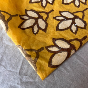 Hand Block Printed Cotton <b>Fabric</b> with Lotus Motif on Mustard Yellow Base - Product Image 1