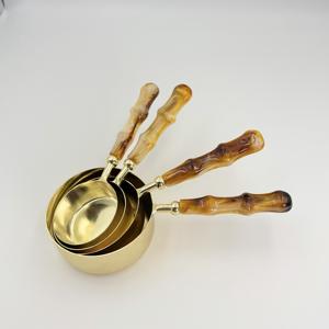 Tasses à mesurer en acier inoxydable finition or avec poignée en résine électroplaquée, ensemble de 4 tasses et cuillères à mesurer, outils de cuisine et de pâtisserie - Product Image 1