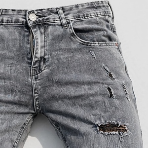 Jean en denim gris déchiré coupe slim pour homme, taille haute, délavé, style décontracté, en coton tissé, jambe droite, collection printemps - Product Image 5