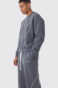 Conjunto de chándal de alta demanda: Sudadera con capucha y cremallera M Star de corte holgado y sobredimensionado, y pantalones de chándal tipo jogger con ribetes para hombre. - Product Image 4