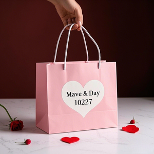 ถุงกระดาษพิมพ์โลโก้สีชมพูสำหรับบรรจุภัณฑ์เสื้อผ้าขายปลีก - Product Image 4