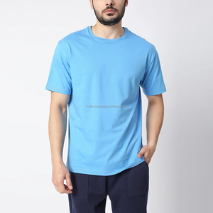 T-shirt en coton bleu clair à manches courtes et col rond pour homme, coupe classique, couleur unie, style décontracté, tissu tricoté respirant - Product Image 1