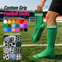 Chaussettes de football personnalisées à forte valeur ajoutée Chaussettes à prise en main d'usine Chaussettes antidérapantes