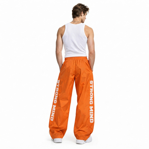 Pantalon coupe-vent imprimé à jambe large pour homme, léger, style streetwear, idéal pour la randonnée et la pluie - Product Image 3