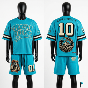 Conjunto de camiseta y pantalones cortos de fútbol de malla de poliéster premium de 180 GSM, color verde azulado con paneles negros, logotipo personalizado con bordado e impresión para hombre. - Product Image 5