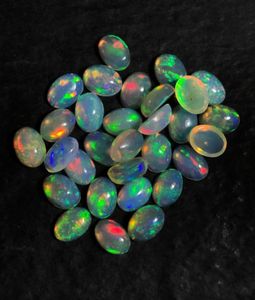 Magnifique opale éthiopienne de forme ovale, cabochons d'opale éthiopienne naturelle. Opale multi-feu à vendre. - Product Image 1