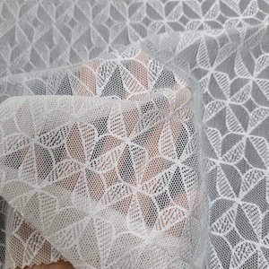 ผ้าลูกไม้ยืดลายเรขาคณิต 147 ซม. น้ำหนักเบา สีตามสั่ง ไนลอนผสมสแปนเด็กซ์ ระบายอากาศได้ดี เนื้อนุ่ม เหมาะสำหรับชุดชั้นใน ชุดนอน ชุดแต่งงาน - Product Image 4